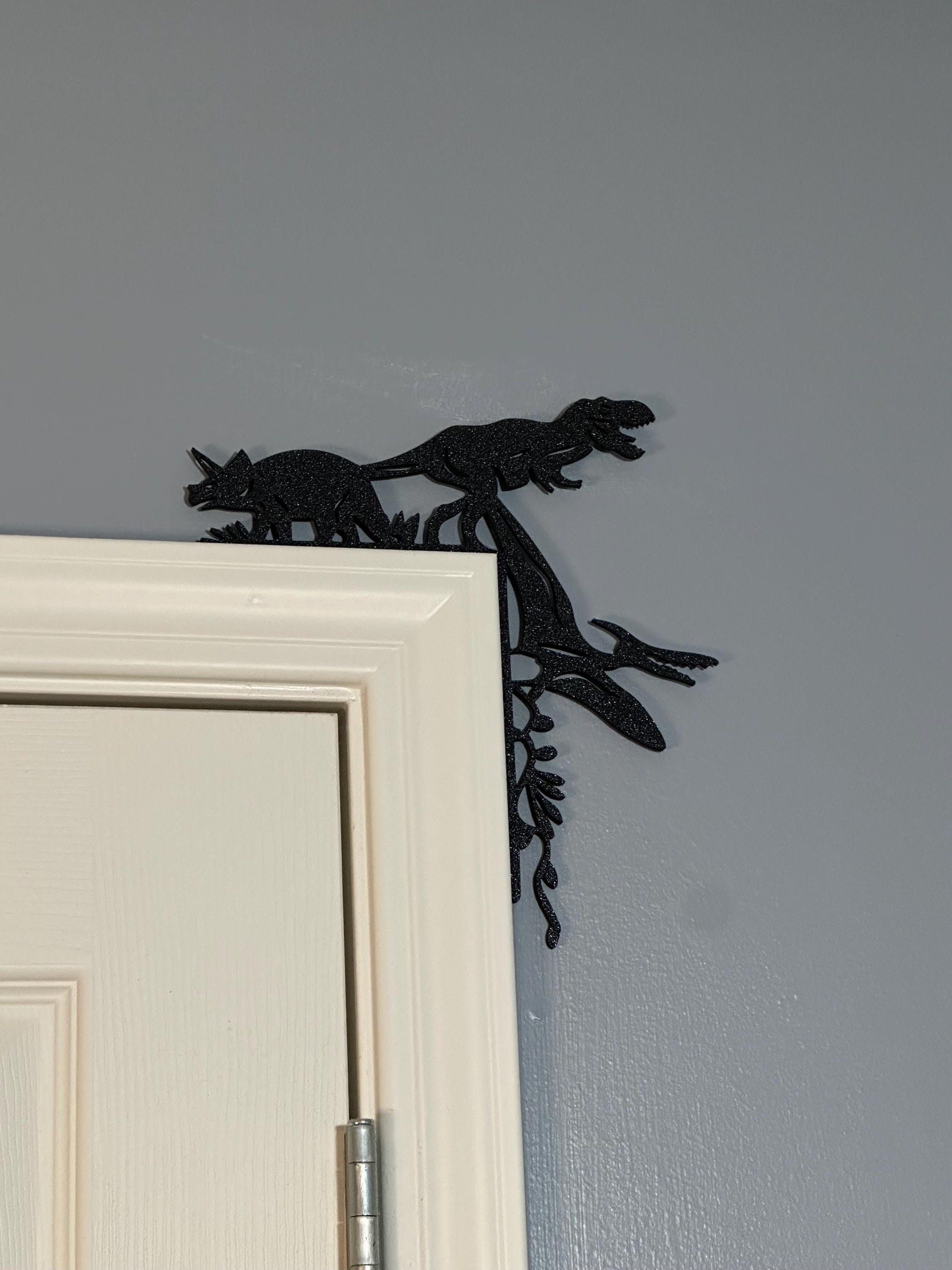 Bringing the Mesozoic Era Home: Dinosaur Door Corner Decor