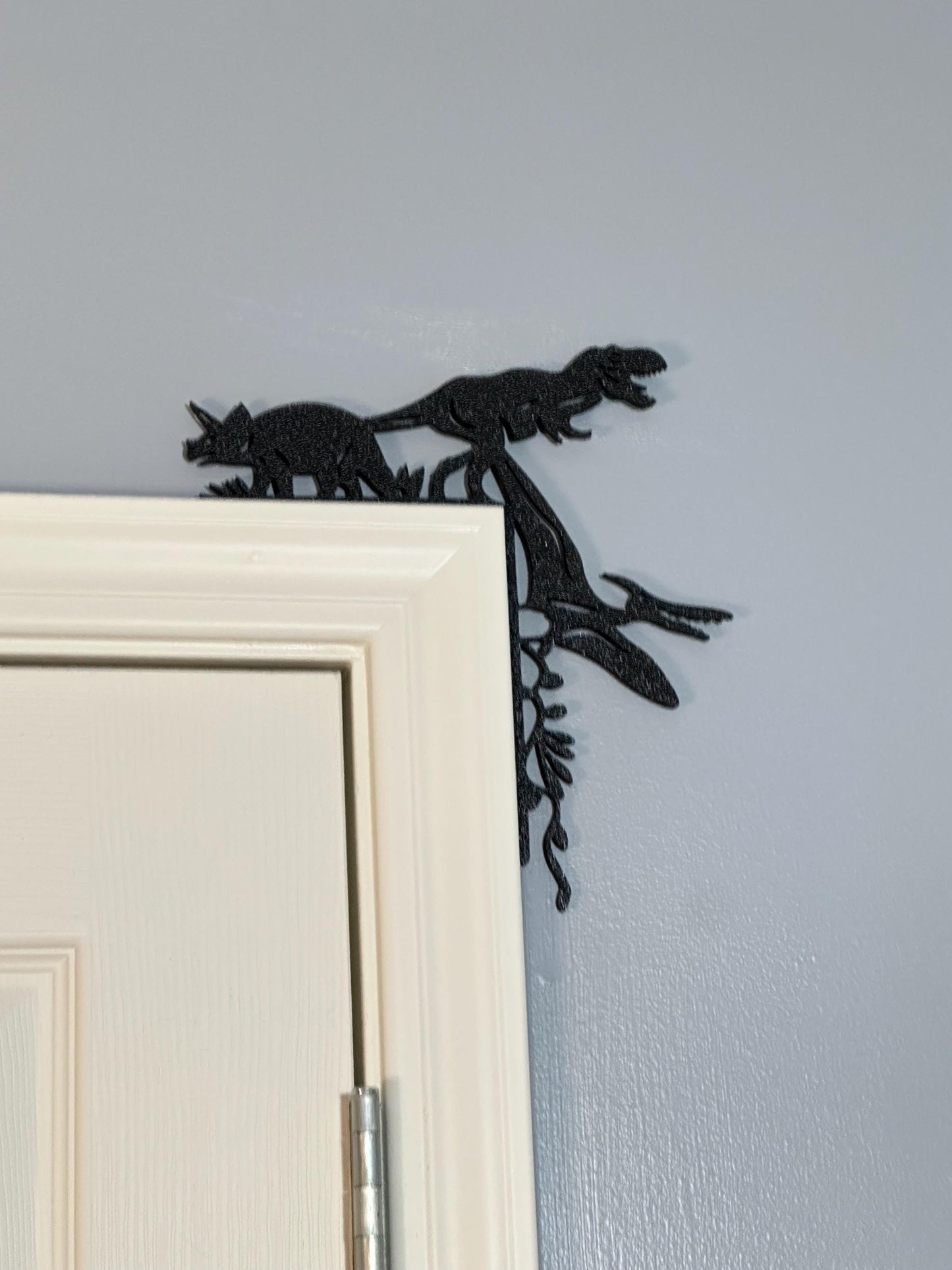 Bringing the Mesozoic Era Home: Dinosaur Door Corner Decor